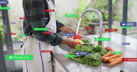 Home Cook Preparing Vegetables Surrounded by Digital Interactions