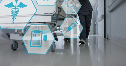 Doctors in Hospital Corridor with Medical Icons Overlay