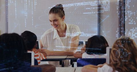 Teacher engaging with students in tech-infused education