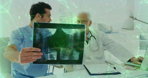 Doctors Discuss X-Ray Scan with Digital Overlay