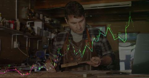 Craftsman woodworking with stock chart overlay symbolizing digital integration