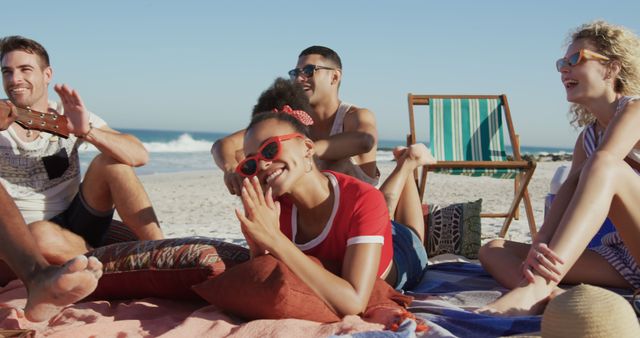 Friends Relaxing and Enjoying Music on a Sunny Beach Day - Download Free Stock Images Pikwizard.com