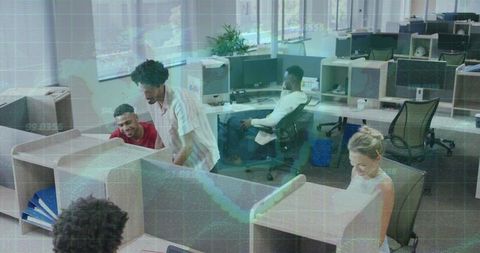 Collaborative teamwork in open-plan modern office setting