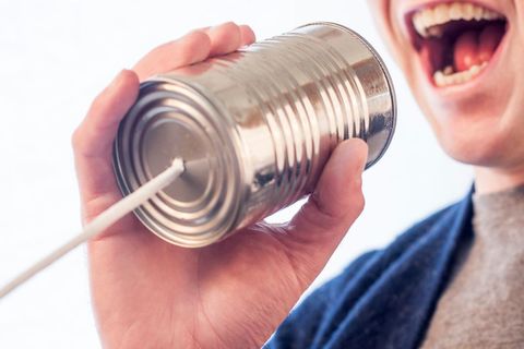 Communication concept with creative tin can phone