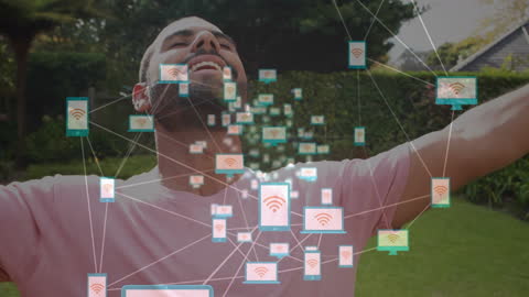 Man Enjoying Digital Connectivity with Technology Icons