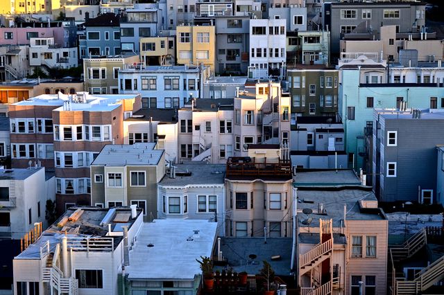 Colorful Urban Cityscape of Densely Packed Residential Buildings - Download Free Stock Photos Pikwizard.com