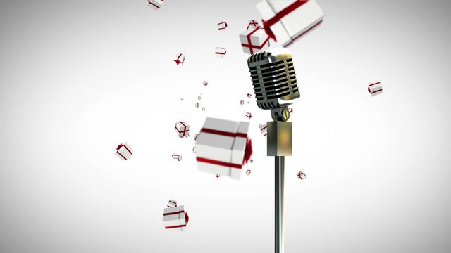 This animated image features a vintage microphone changing colors from red to green amidst floating Christmas gift boxes on a white background. Perfect for holiday-themed music events, festive greeting designs, concert promotions, or seasonal social media posts.