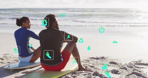 Couple sitting on surfboards at sunlit beach with eco icons and ocean horizon