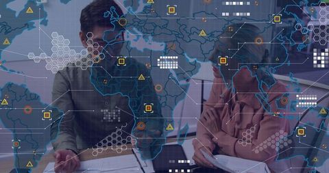 Reviewing global analytics overlay while collaborating on strategy and data-driven decisions