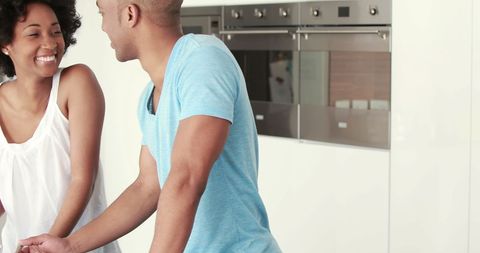 Happy Couple Bonding in Modern Kitchen