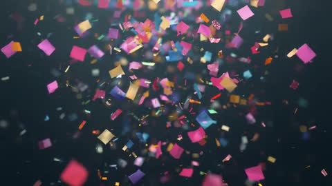 Dynamic Splash of Vivid Rainbow Confetti on Dark Studio Background