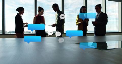 Silhouettes of Professionals Engaging in Digital Collaboration