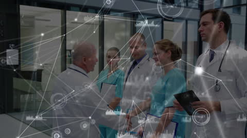 Doctors Embracing Healthcare Technology in Futuristic Hospital