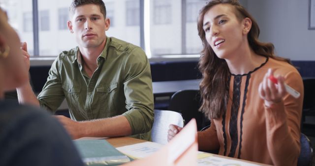 Young Team Collaborating During Business Meeting in Modern Office - Download Free Stock Images Pikwizard.com