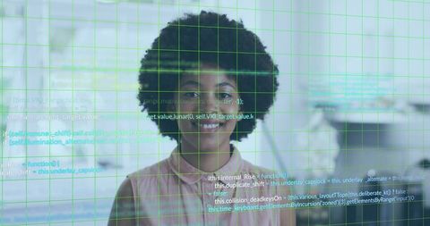 Smiling professional woman wearing glasses with tech grid and code overlay headshot