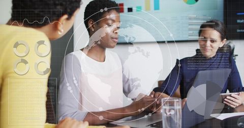 Business Team Discussing Global Insights with Digital Interface - Download Free Stock Images Pikwizard.com