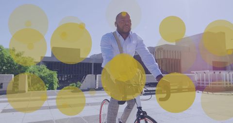 Urban Businessman Bicycling through Sunny Cityscape
