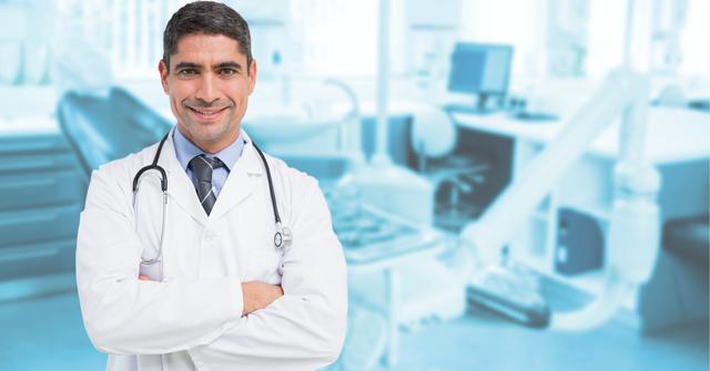 Doctor standing with arms crossed against operation theatre background - Download Free Stock Photos Pikwizard.com