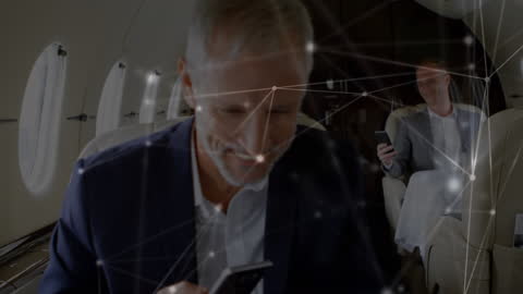 Business Executives Enjoy Digital Connectivity on Private Jet