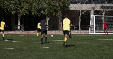 Soccer Team Practicing Coordination on Field