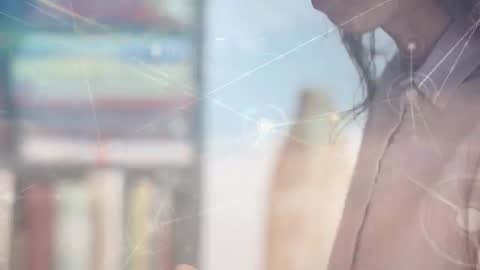 Businesswoman Interacting with Futuristic Virtual Interface in Office