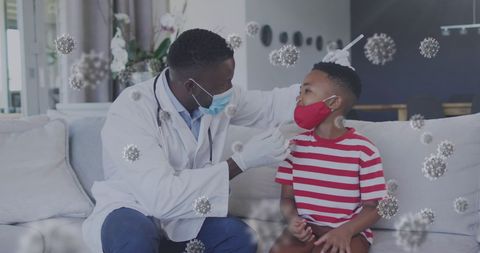 Doctor conducting covid-19 test on boy amidst virus cells