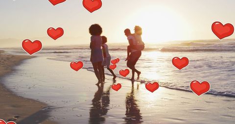 Family Enjoying Beach at Sunset with Heart Overlay
