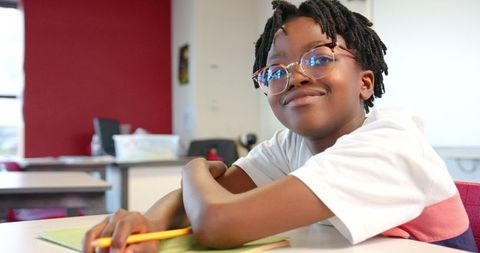 Confident Student in Classroom Studying with Focus
