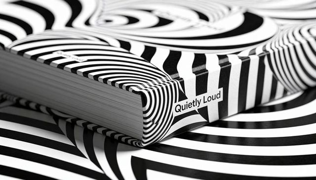 Hypnotic monochrome paperback wrapping quietly loud spine with optical stripe illusion
