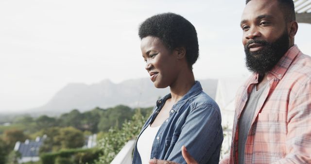 Happy Couple Relaxing on Balcony with Scenic Mountain Views - Download Free Stock Images Pikwizard.com