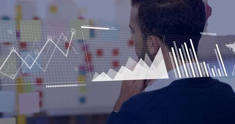 Man studying holographic data visualization with line, area and bar charts for analytics