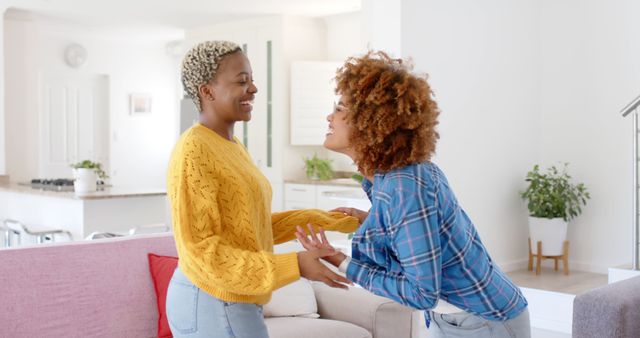 Happy Young Women Chatting in Bright Living Room - Download Free Stock Images Pikwizard.com