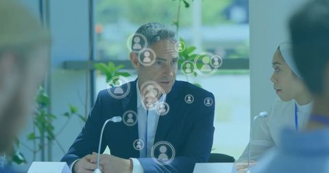 Caucasian Businesspeople Networking with Digital Connectivity Icons - Download Free Stock Images Pikwizard.com
