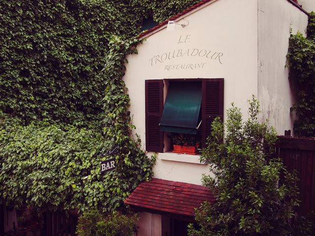 Vintage Exterior of Le Troubadour Restaurant Covered in Climbing Ivy - Download Free Stock Images Pikwizard.com
