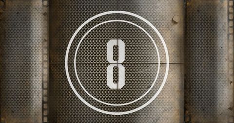 Retro film countdown with number eight on rusty metal background