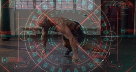 Shirtless athlete lunging and crawling with futuristic hud overlay in gym