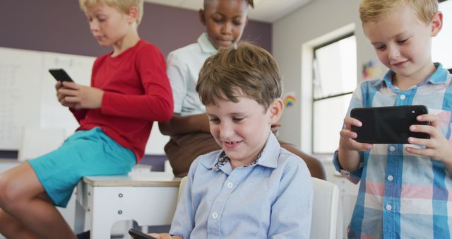 Children Engaging with Smartphones in Classroom Setting - Download Free Stock Images Pikwizard.com