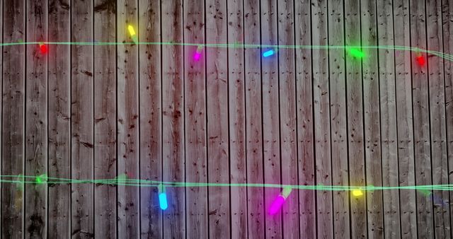 Colorful Flickering Fairy Lights Against Wooden Background - Download Free Stock Images Pikwizard.com