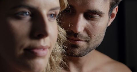 Close-Up of Romantic Couple Smiling and Connecting