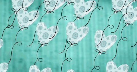 Heart Balloons Floating on Bright Blue Background