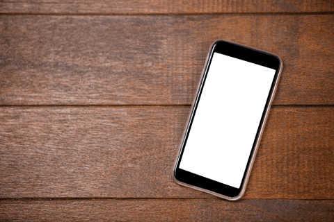 transparent smartphone display on wooden office desk - Download Free Stock Videos Pikwizard.com