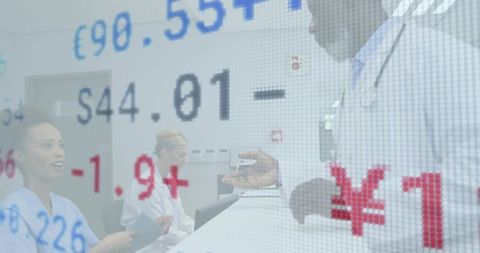 Healthcare Professionals Discussing amidst Stock Market Data Overlay