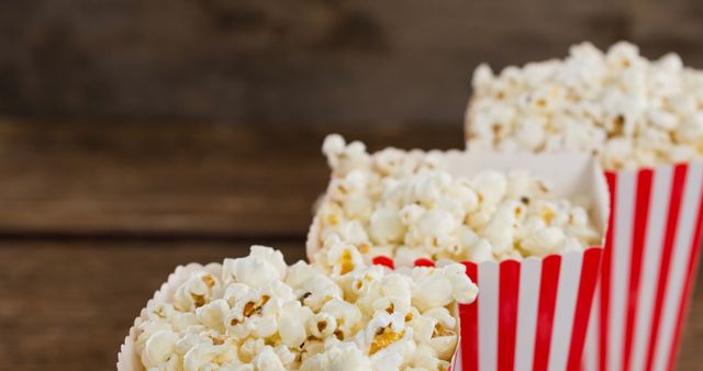 Boxes of Fresh Popcorn on Rustic Wooden Table - Download Free Stock Images Pikwizard.com