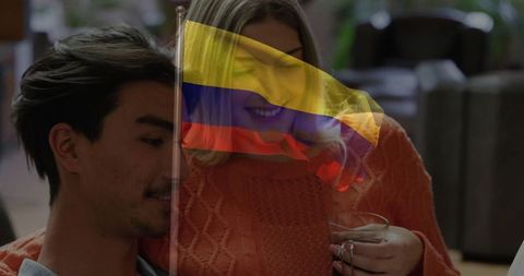 Cozy Couple Relaxing with Hot Beverage in Lounge