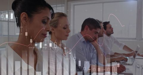 business team analyzing financial trends in office meeting - Download Free Stock Images Pikwizard.com