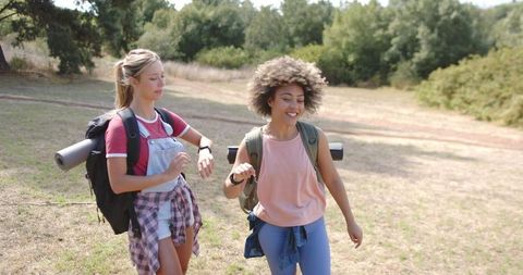 Young Women Enjoying Outdoor Adventure and Conversation