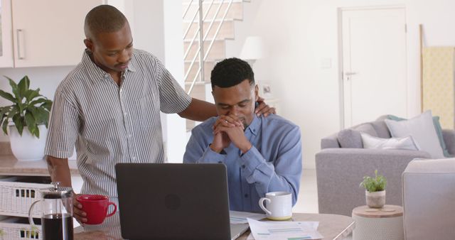 Supportive Friend Comforting Anxious Man at Home Office - Download Free Stock Images Pikwizard.com