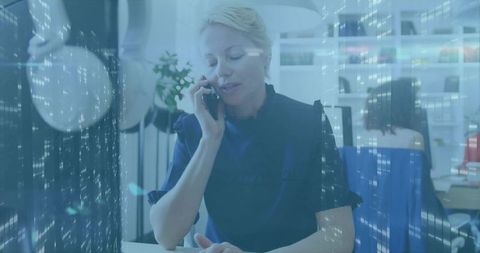 Executive communicating on smartphone with digital interface overlay