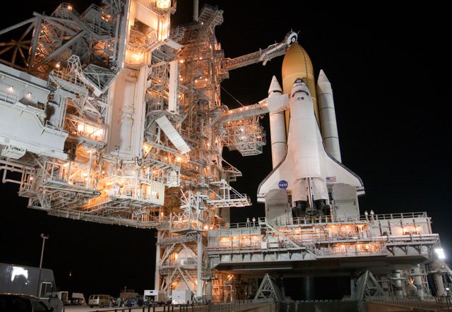 Space Shuttle on Launch Pad at Night with RSS Rollback - Download Free Stock Photos Pikwizard.com