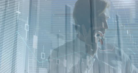 Businessman Talks on Smartphone Amidst Data Financial Graph Overlay